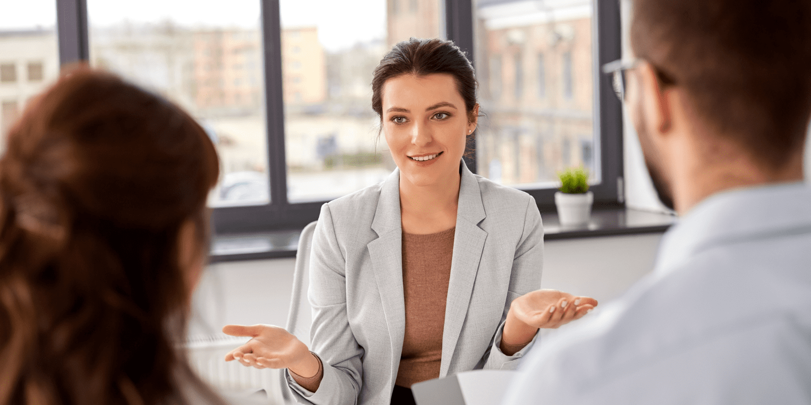 Woman at a Job Interview with a two person panel