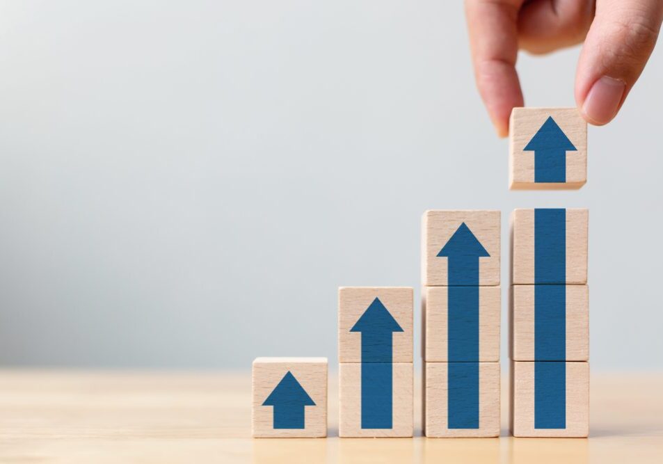 Ladder career path for business growth success process concept.Hand arranging wood block stacking as step stair with arrow up